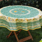 Nappe toile cireè ronde motif tournesol vert  160 CM