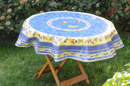 Nappe toile cireè ronde motif tournesols bleu 160 cm